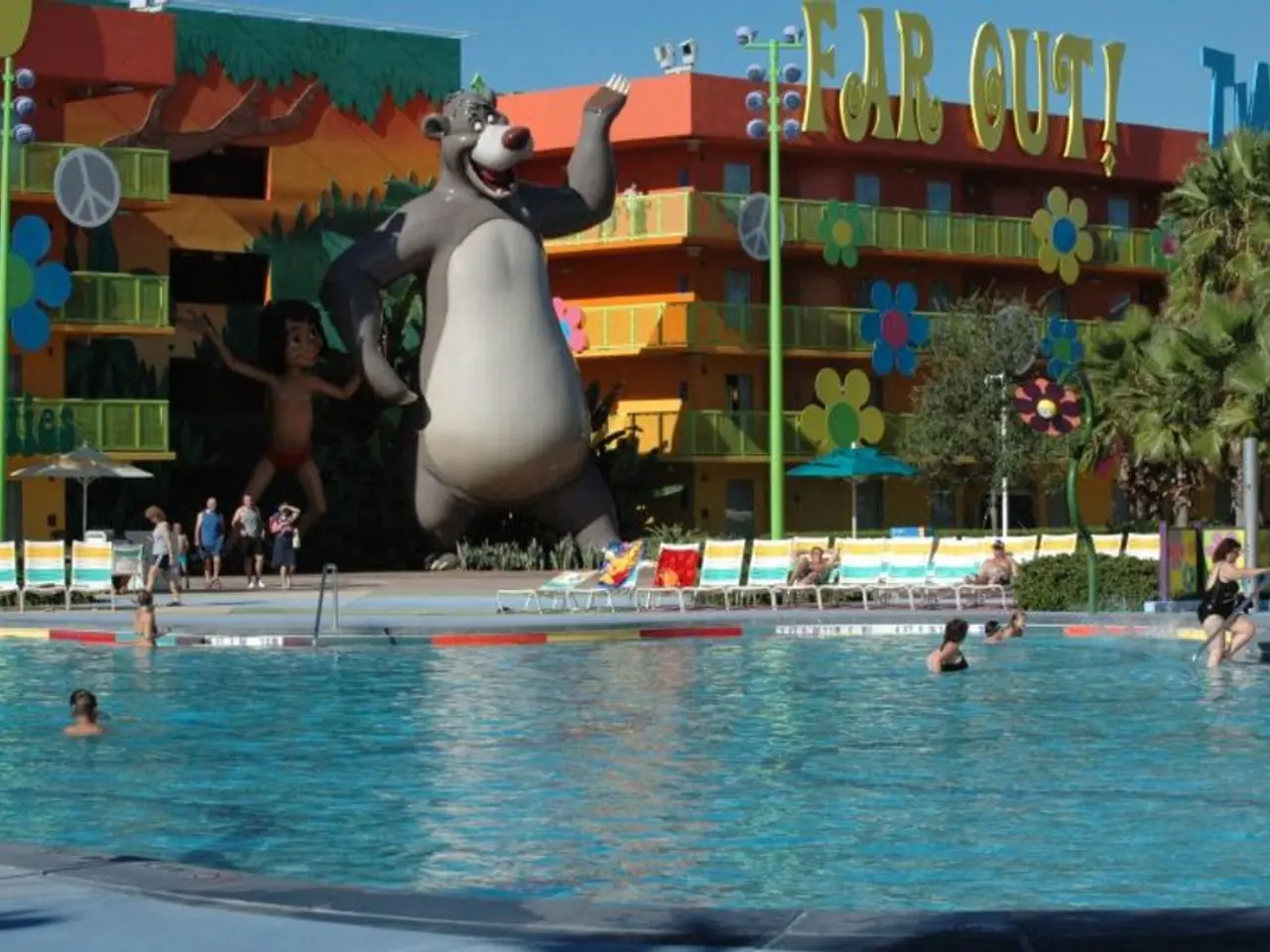 Multitudes of swimmers engaging in aquatic activities within the Dresden Elbe River