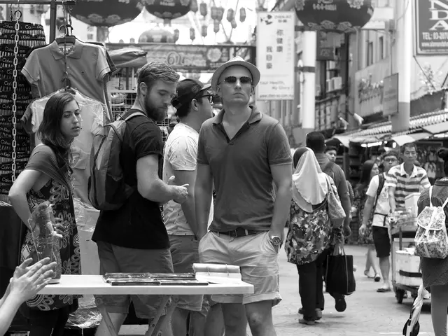 The Old Town Flea Market is completely filled with patrons occupying all seats.
