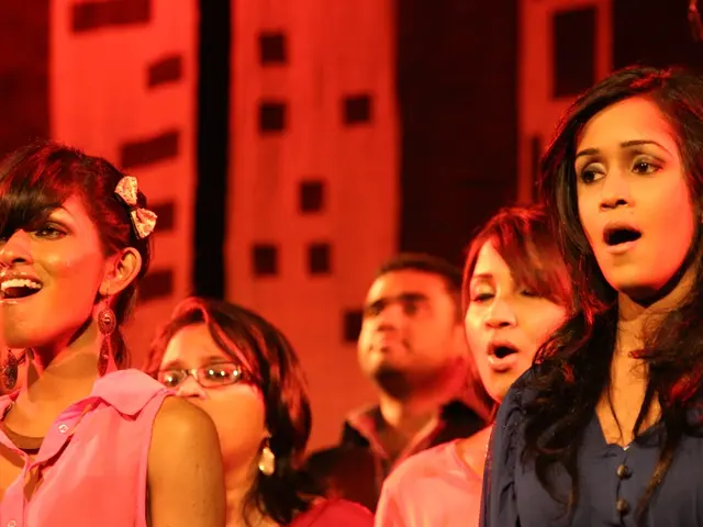 Nicole Scherzinger dazzles in a vibrant red outfit, capturing everyone's attention with her...